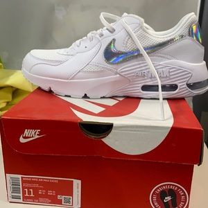 Brand new in box . Women’s size 11 all white with silver Nike sign Air Max